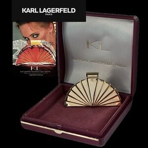 Vintage Karl Lagerfeld Paris Gold Tone Art Deco Fan shaped brooch.
Signed